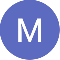 M B